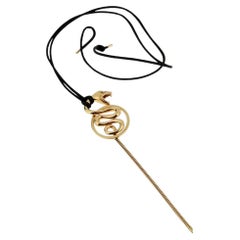 Boucheron - Collier serpent en or et corde de soie