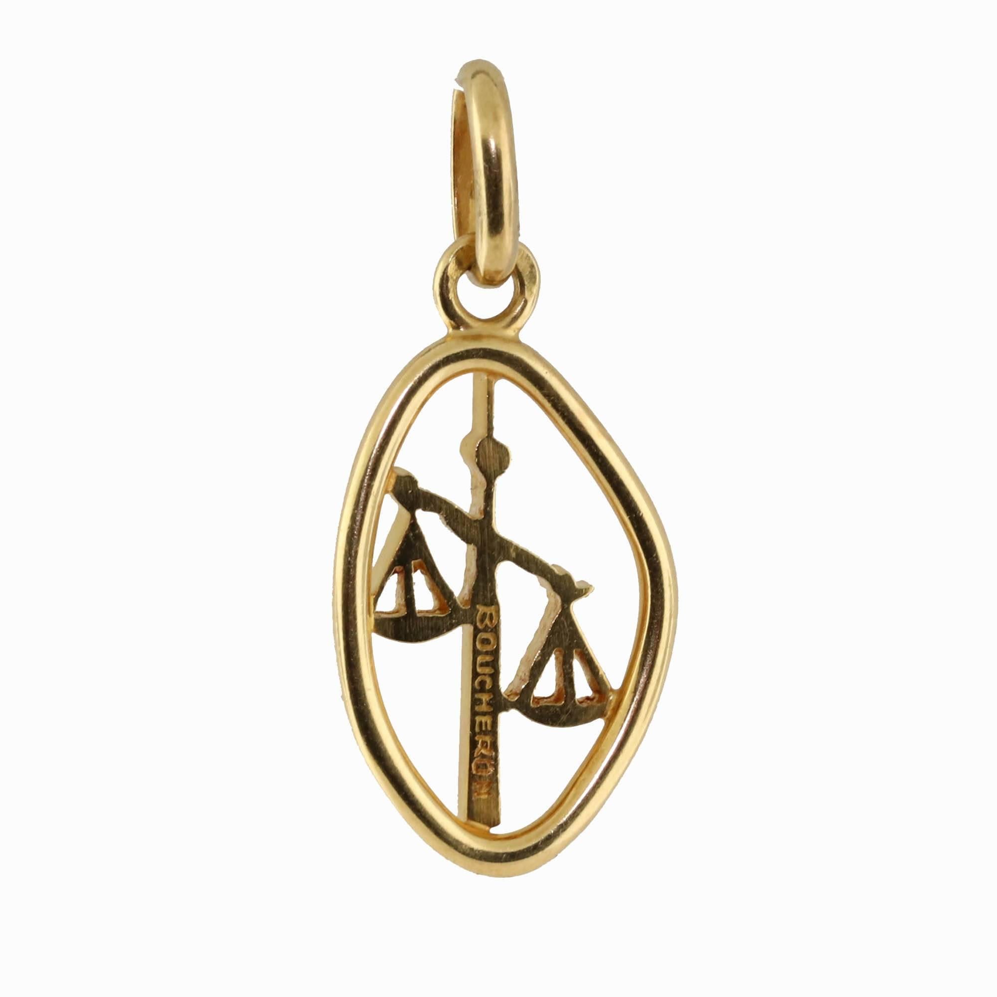 A wonderful Boucheron 18k yellow gold zodiac pendant of the sign Libra. These pendants are extremely difficult to find as they are no longer in production. This pendant works great as well for someone who passed a law exam as it signifies the