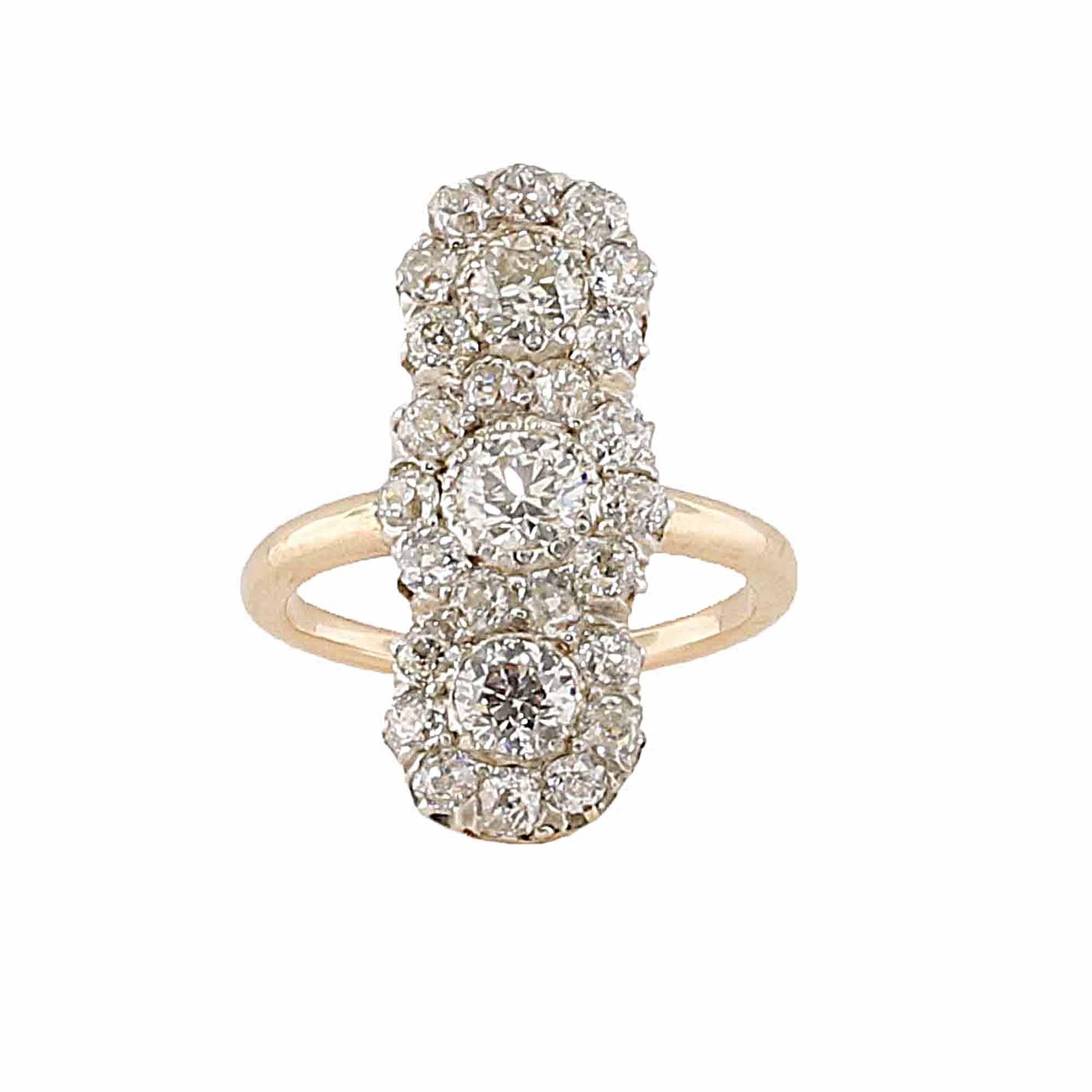 Gorgeous one of a kind, show stopping 3 stone diamond ring. 3 larger diamonds surrounded by smaller rounds make this ring something special. The length of the ring also makes it extremely unique. Size 4. Ring can be sized to a 5 at no cost to the