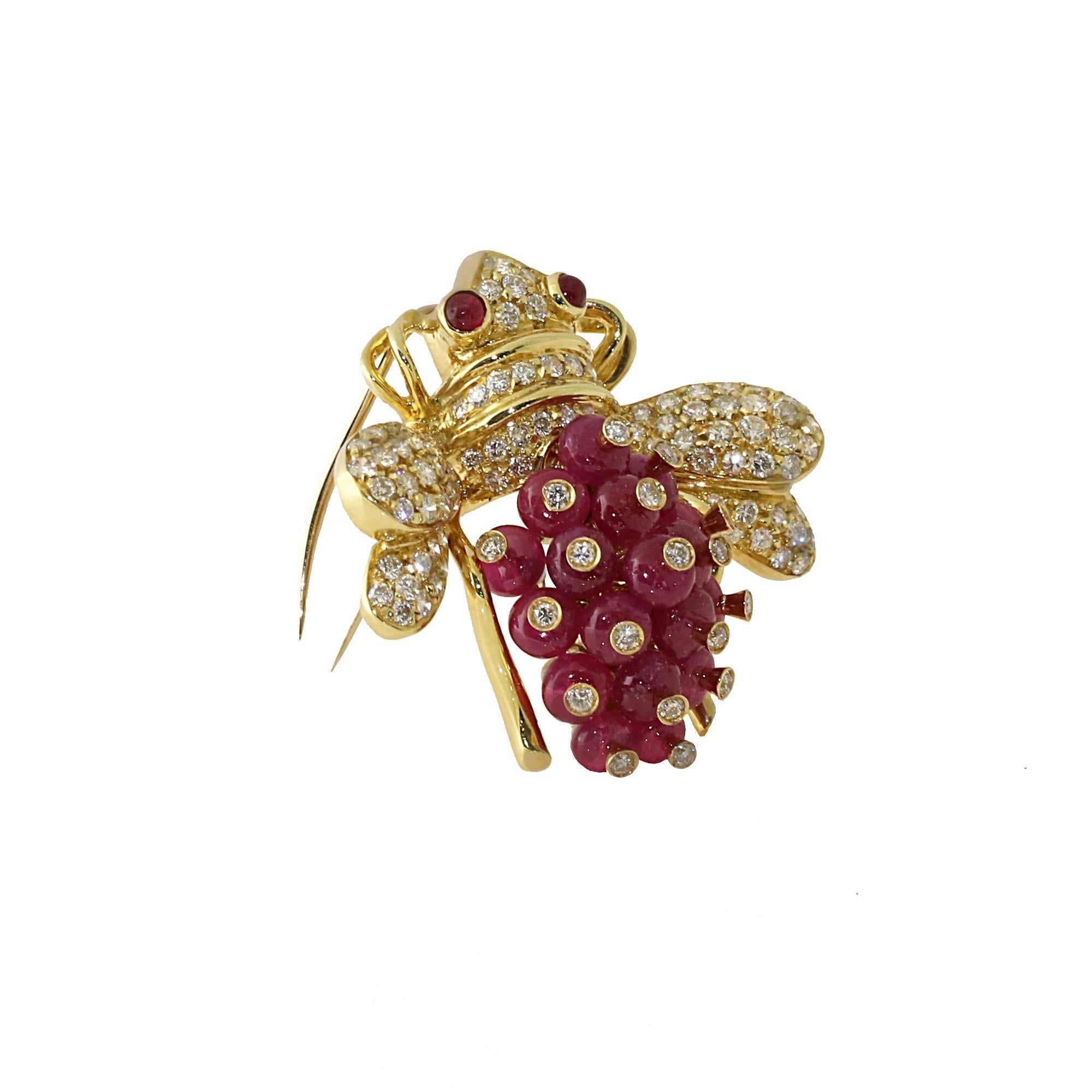 Beautiful and fun Bee pin made in 18k yellow gold. The pin is made with ruby and diamond accents. 
Diamonds weight~ 1.10 ctw
16.3 grams of gold

Pin measures 3cm long x  3.25cm wide 