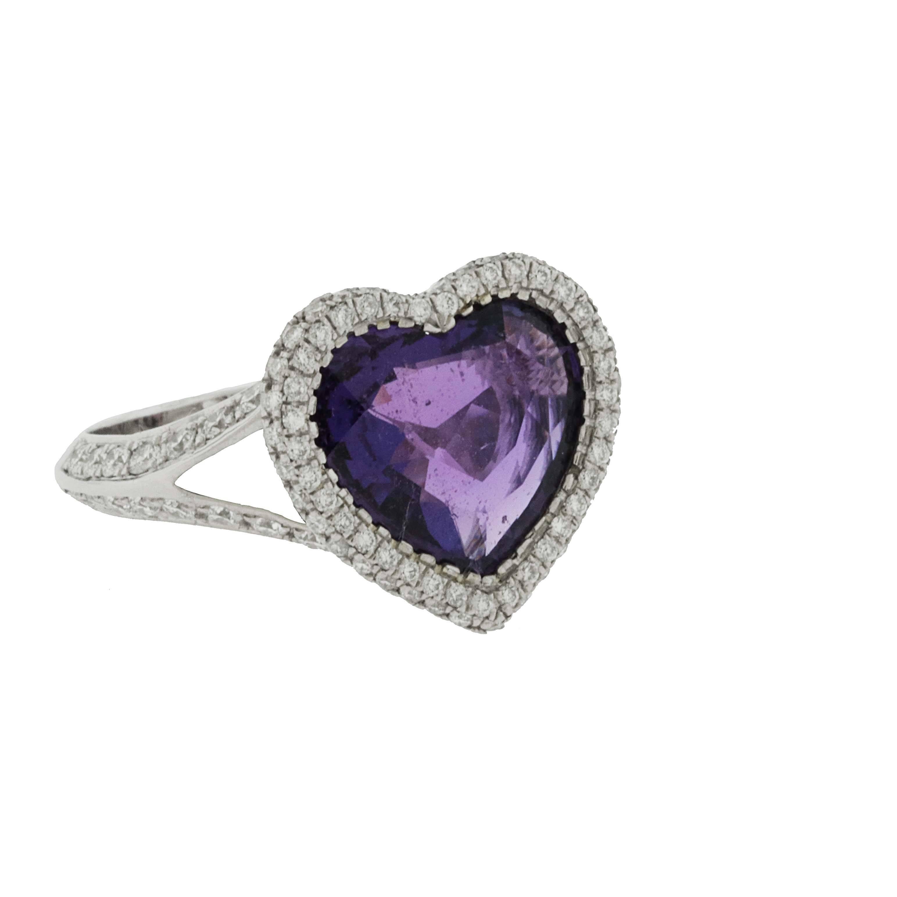 This gorgeous 4.16 Carat purple sapphire ring is truly beautiful. It is an unheated sapphire which means the color is natural, making this very rare. The heart shape is a sign of love and this ring says it all. GIA Certified Purple Sapphire

The