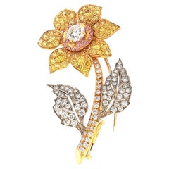 Broche de flor con diamante natural multicolor de 0,32 ct, F/VS1, certificado por el GIA, en oro de 18 k