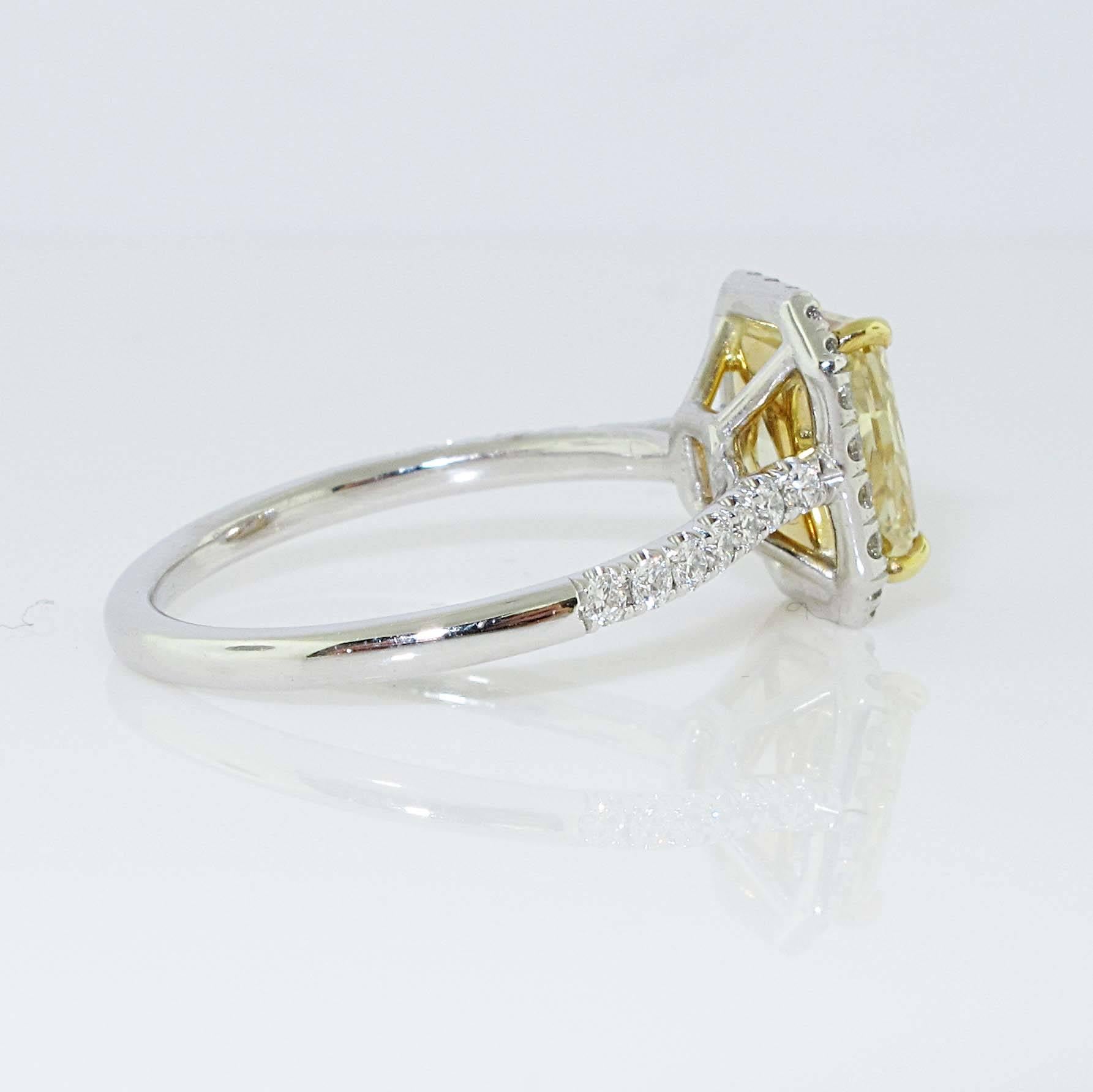 Truly a great colored yellow diamond engagement ring. This 1.67 carat Fancy Yellow Radiant diamond ring is great as either an engagement ring or a fashion ring. Either way you will be the talk of your friends. The mounting is platinum and adorned