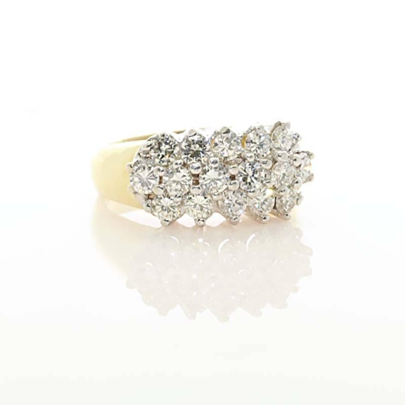 A great cocktail ring for all occasions. This 14kt yellow gold and round diamond ring will look great on anyone's hand. The diamonds are set in white gold to make them even brighter. 16 Diamonds are all perfectly nested to create this masterpiece.