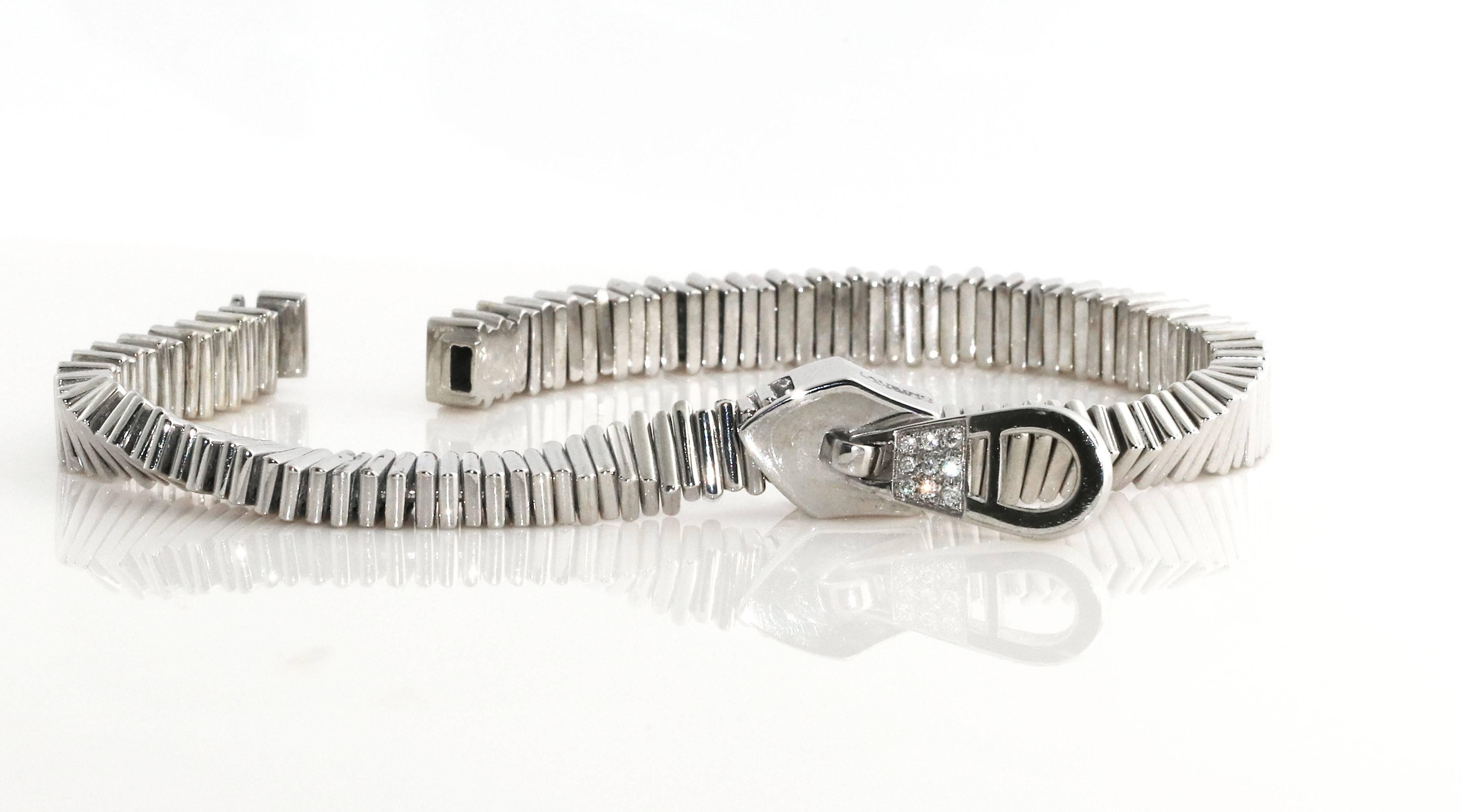 Such a cool and unique bracelet. This Italian made Staurino Fratelli white gold and diamond zipper bracelet. This is exquisitely made and is truly unique. The flex in the zipper makes for a super special piece. The diamonds on the zipper tongue make