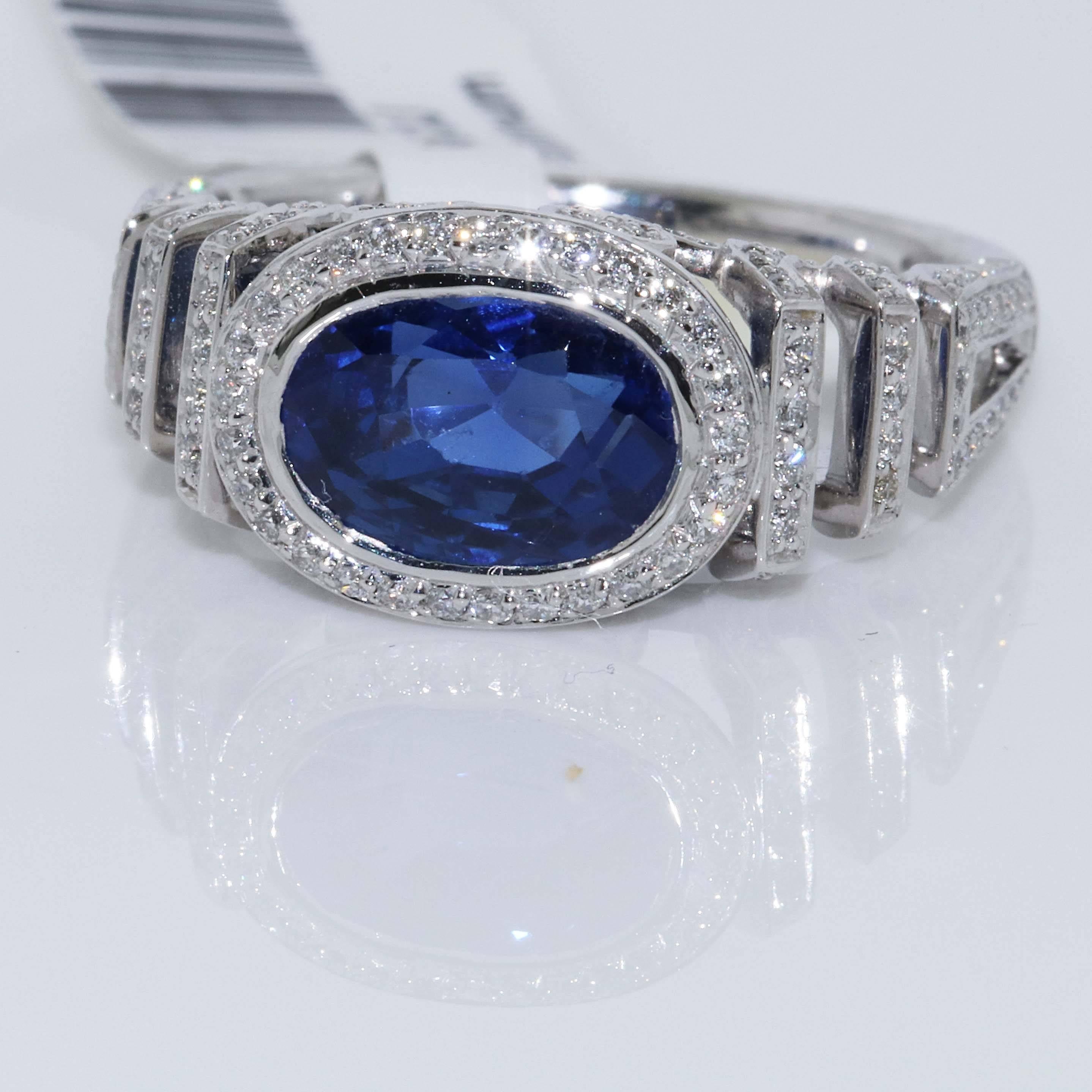 Oval Cut AGTA Certified No Heat Blue Sapphire and Diamond Cocktail Ring For Sale