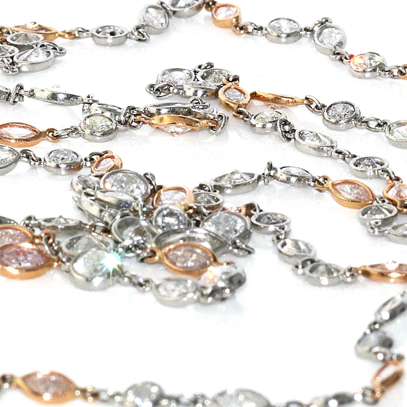 A one of a kind Pink and White Diamond by the yard necklace. This gorgeous necklace is set in both Platinum and 18kt Rose gold making this an extremely high quality piece that cannot be matched. Set among the white diamonds are natural pink