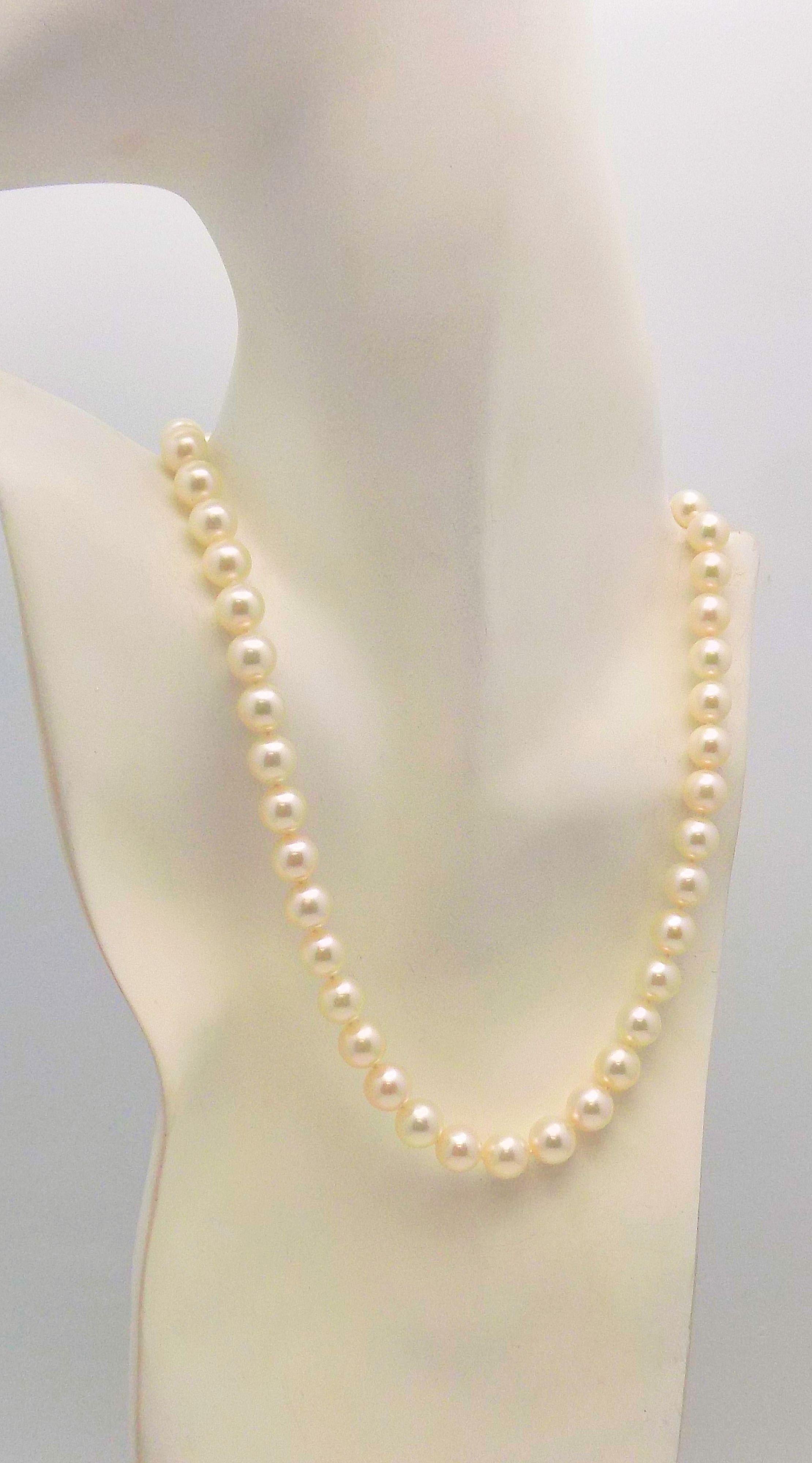 Strand of 45 Cream Rose Cultured Pearls In Excellent Condition For Sale In Dallas, TX