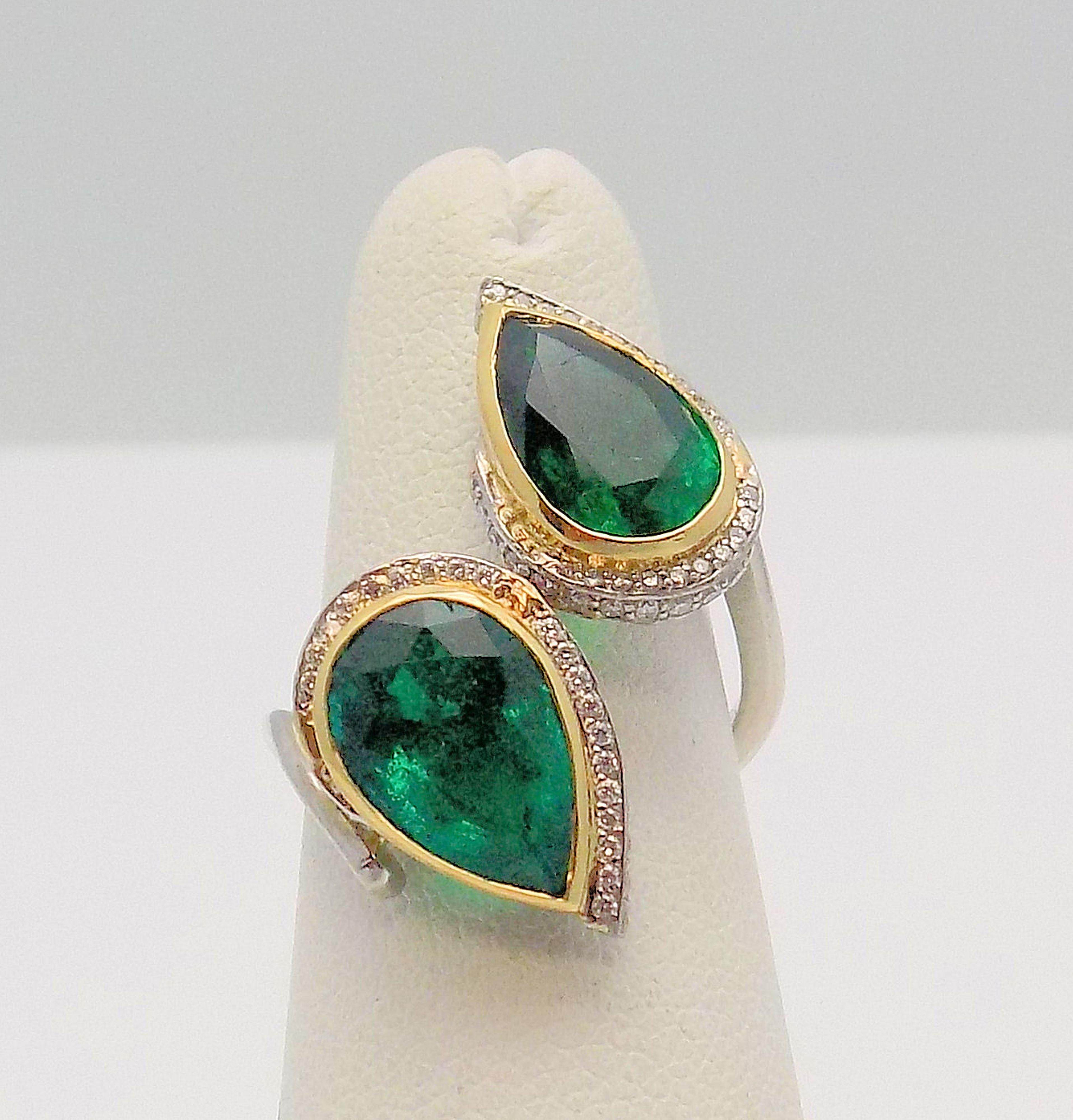 Women's Pear Shaped Emeralds and Diamond Bypass Ring in Platinum and 18 Karat Gold For Sale