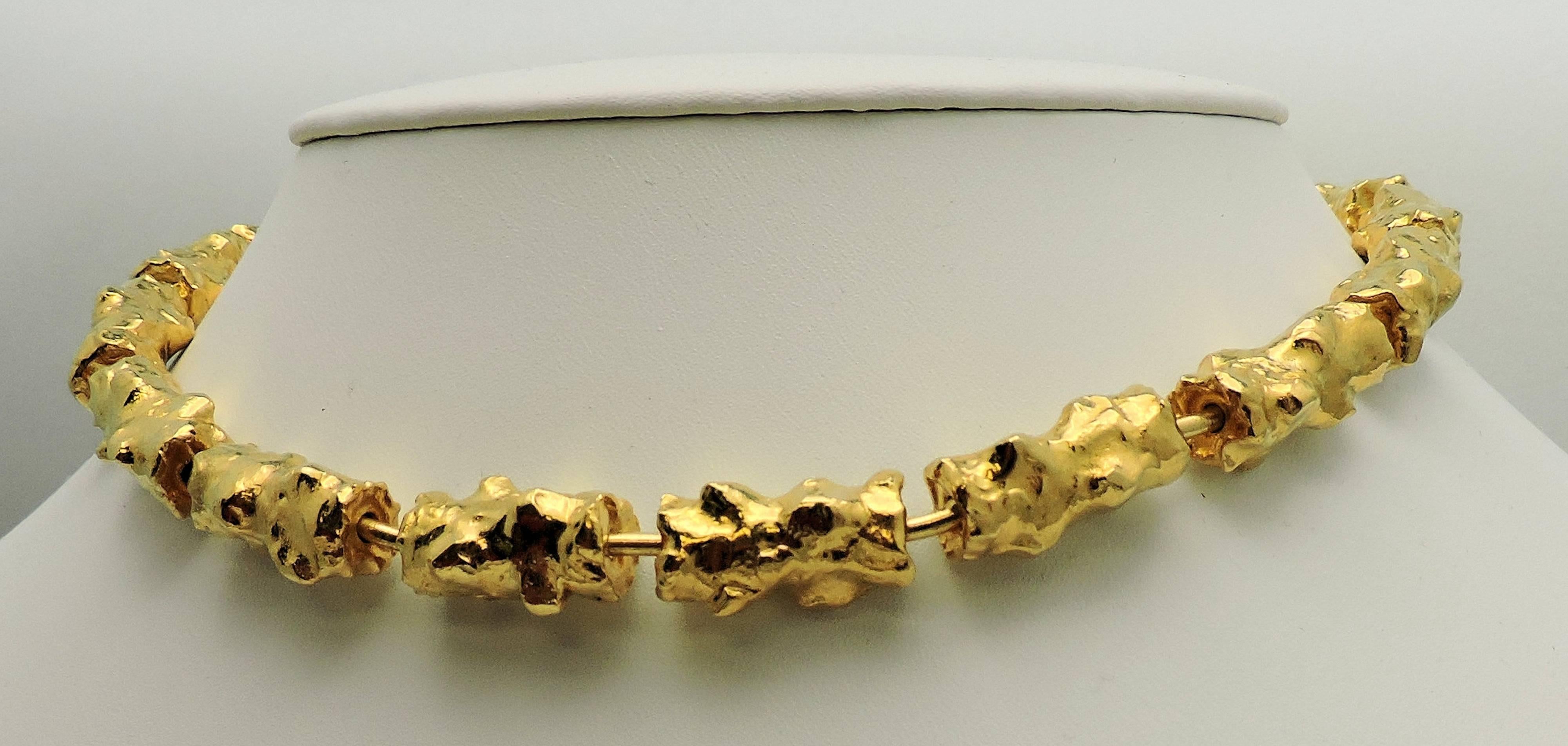 Deeply textured detail links connected by bar to create a one-of-a-kind choker necklace by one of the most famous designers of the 20th century.  Each piece is individually crafted by hand.  Sold by Neiman Marcus. These heavy pieces are hard to find