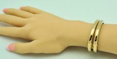 Pair of Classic Yellow Gold Hinged Bangle Bracelets