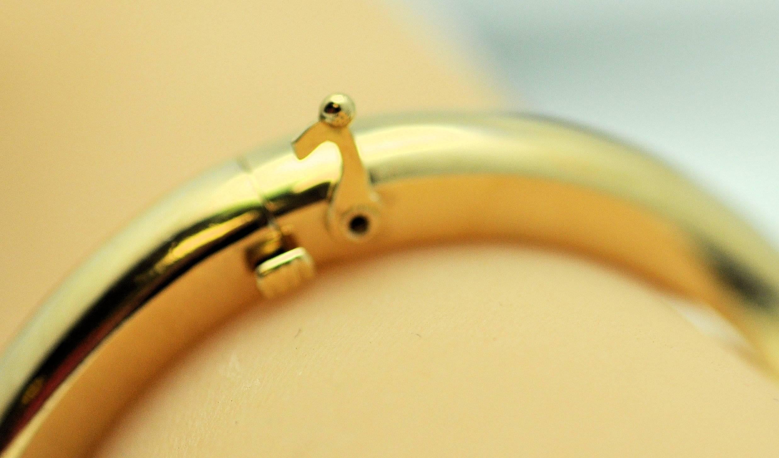 Women's Pair of Classic Yellow Gold Hinged Bangle Bracelets For Sale