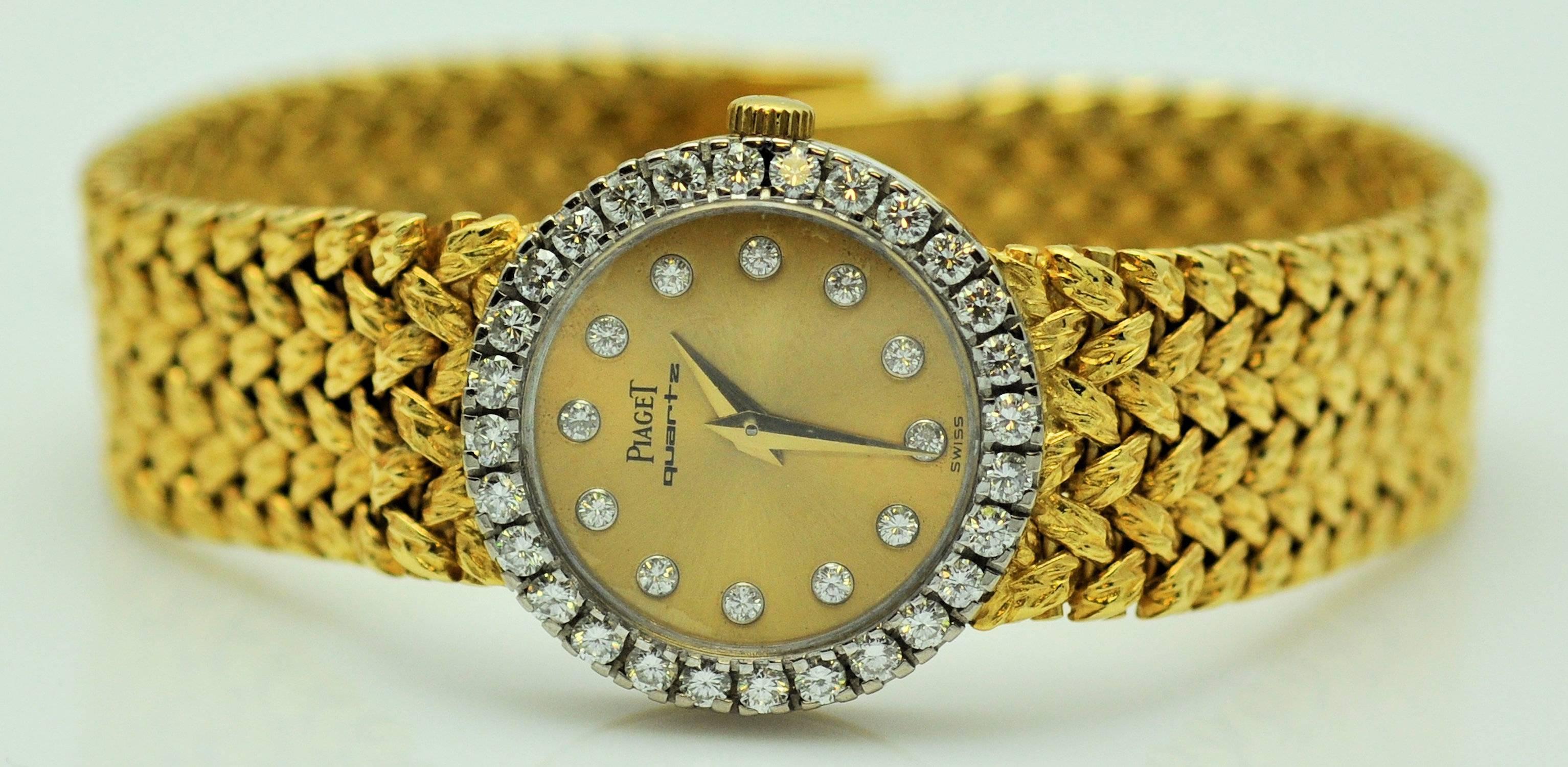 Lovely Piaget diamond dress quartz wrist watch with diamond studded dial and diamond bezel.  40 round diamonds approx. 0.68 ct. total weight of very fine quality, VVS-2, G. Box. Extra gold from bracelet. Running and good order. 33 dwt gross wt. 