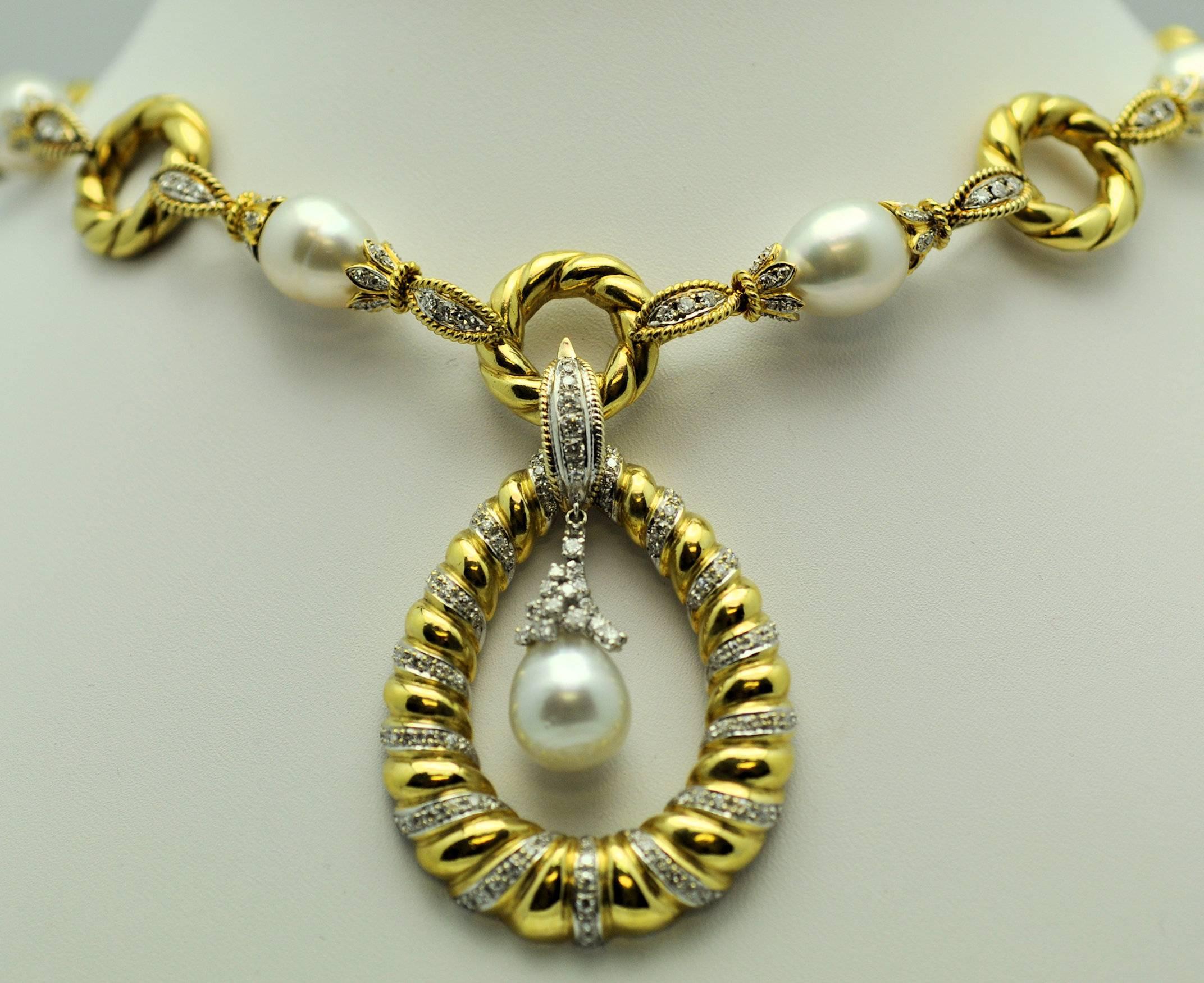 Opera length necklace of twist links adorned with South Sea Cultured Pearls and diamonds. Fourteen South Sea pearls measuring 10-12 mm., baroque, with beautiful and bright luster.  Links are tipped with bell caps contains diamonds.  Necklace