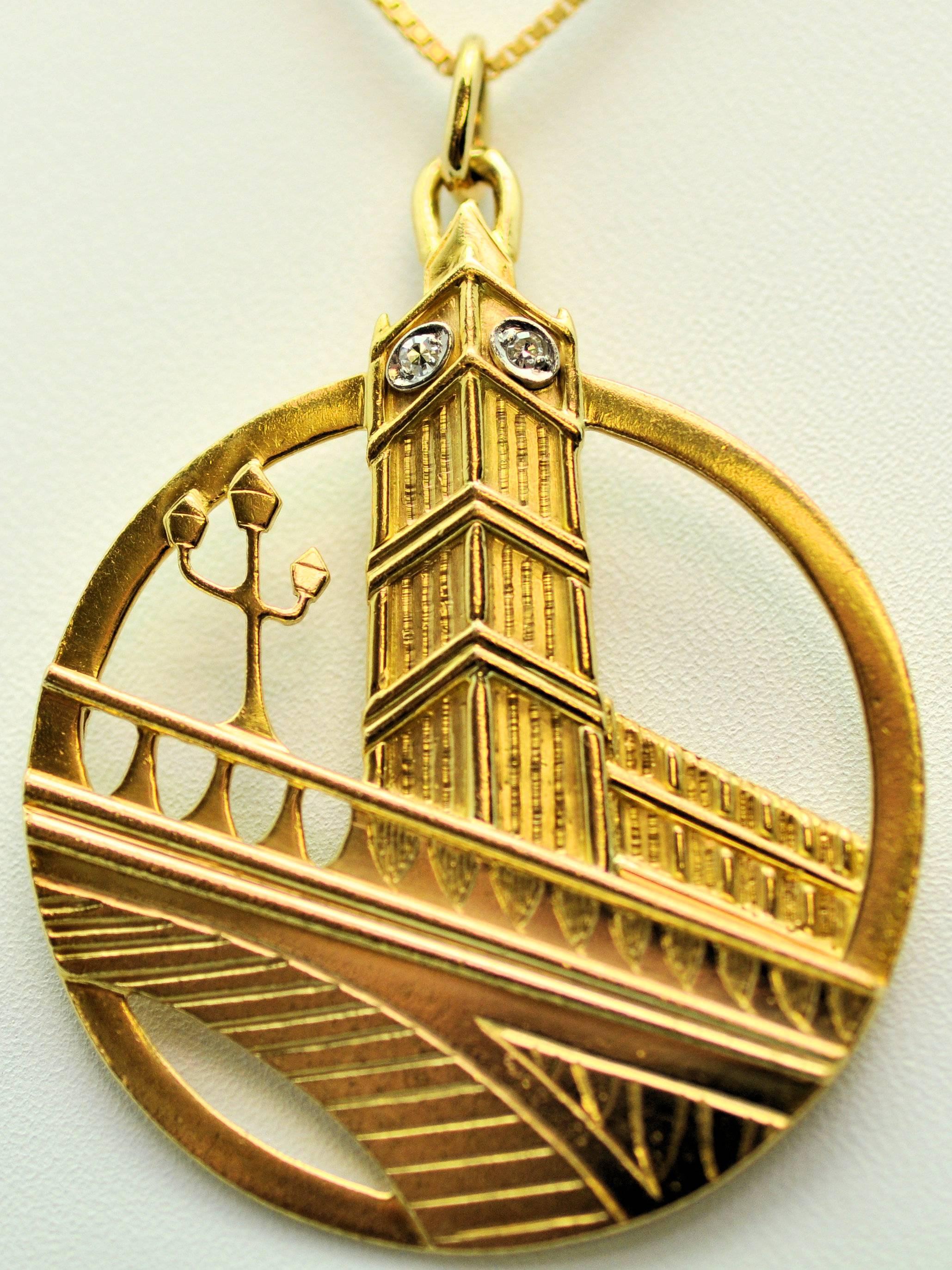 18K yellow gold dramatically styled Big Ben pendant/charm with bridge and light post.  Diamonds set in clock face. Signed Cartier, with full British hallmarks for 18K, London, 1977, maker JG.  Two diamonds total 0.04 ct, total weight. VS-1, G. Chain