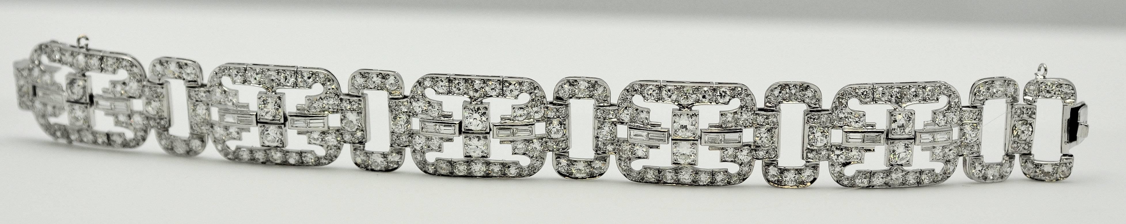 Beautiful wide Art Deco platinum and diamond bracelet with with 237 round diamonds and 20 baguette cut diamonds for a total weight of 13.50 ct. total weight VS/SI, G-H-I.  Metal not marked, but tested. Excellent workmanship, note the photo of the
