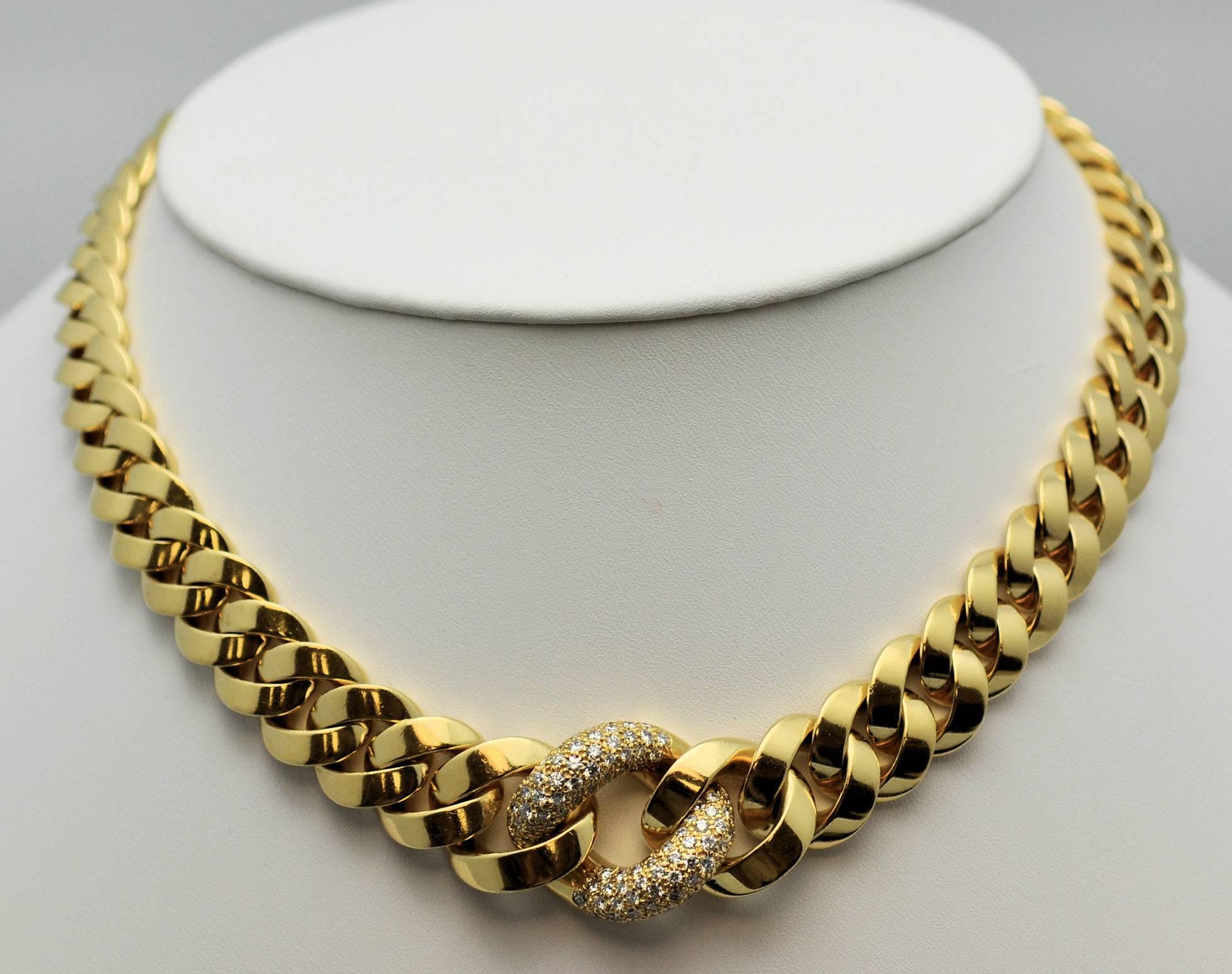 18Karat yellow gold solid curb link choker necklace with center link pave' set with diamonds.  Contains 94 round diamonds for a total weight of approximately 2.00 carats of grade VVS, G.  Weighs 120.7 dwt. or 190.37 gr.
.8 in. wide at center
.3