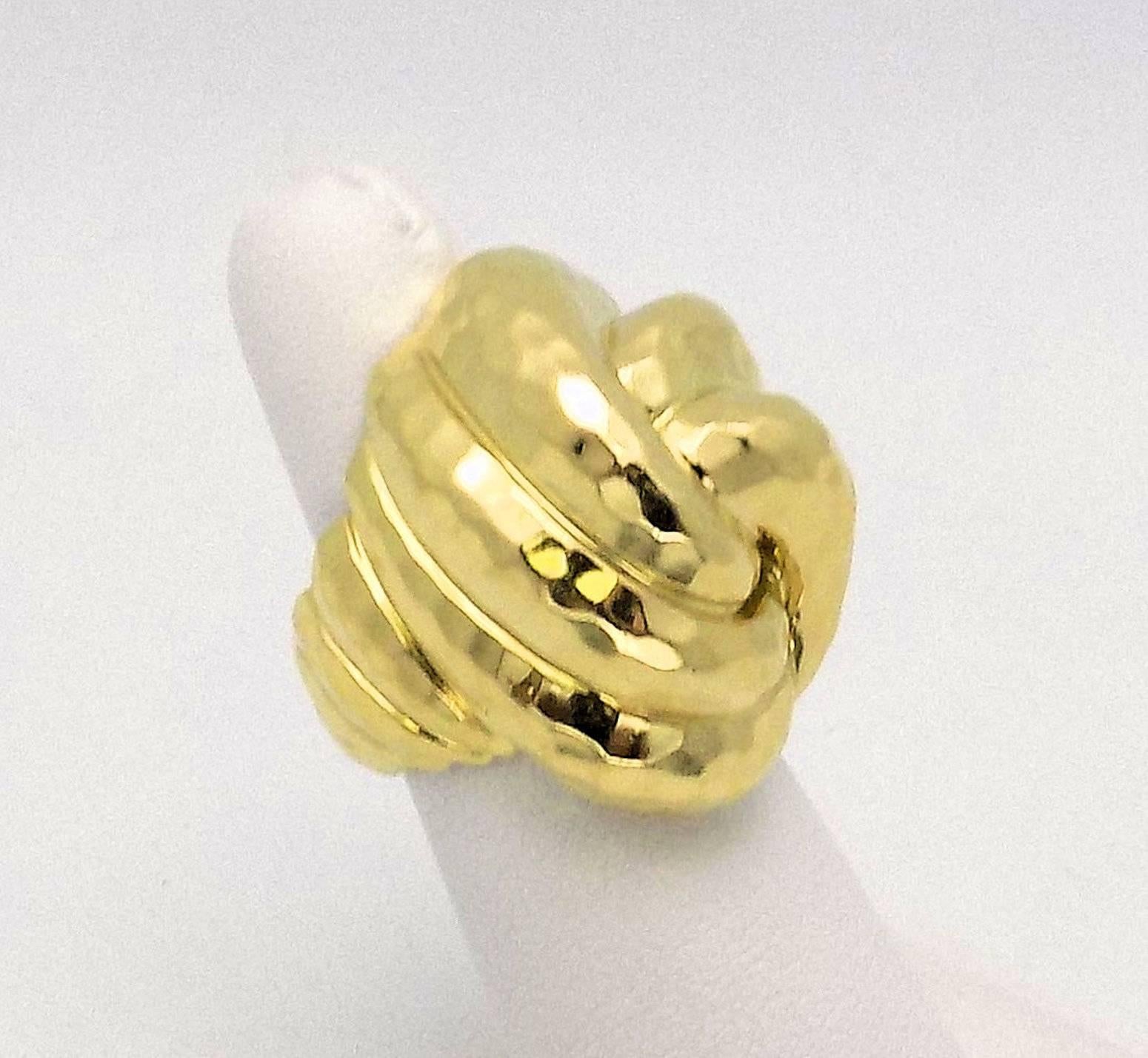 Lovely 18 Karat yellow gold ring by famed maker, Henry Dunay.  One of his most sought-after ring styles, high dome double knot style.  Shank is lines with sizing shank, fits 6.5 - 7.  This is the one everyone wants!! 16.4 dwt. Style B 1060.
