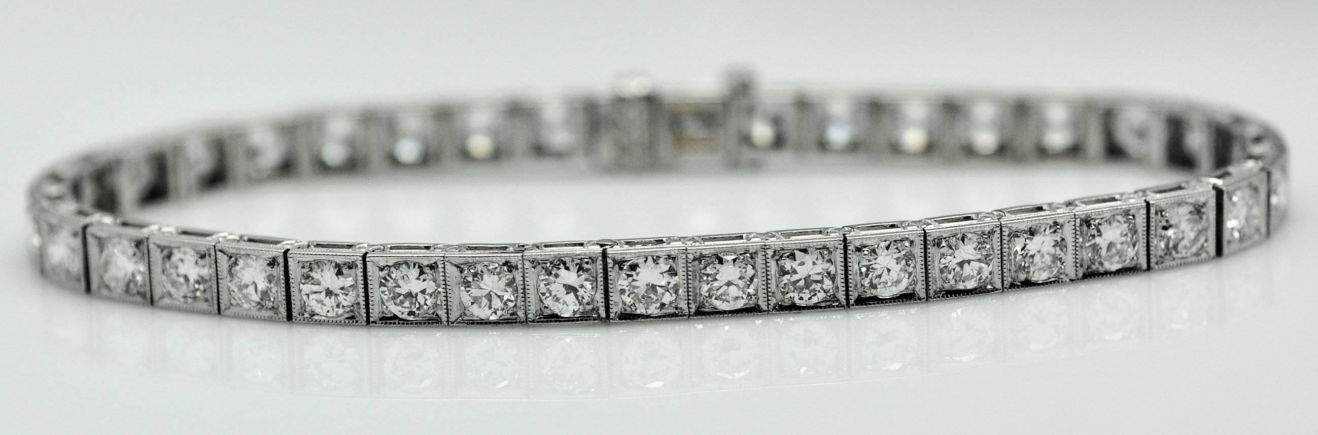 A Classic Art Deco diamond bracelet, square links, each set with a European cut diamond.  Known in lore of the time as "service stripes," ladies were supposed to get one for every year they were married.  They were worn stacked on the same