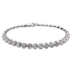 18KT White Gold Heart Shape Diamond Tennis Bracelet – 4.84 Carat