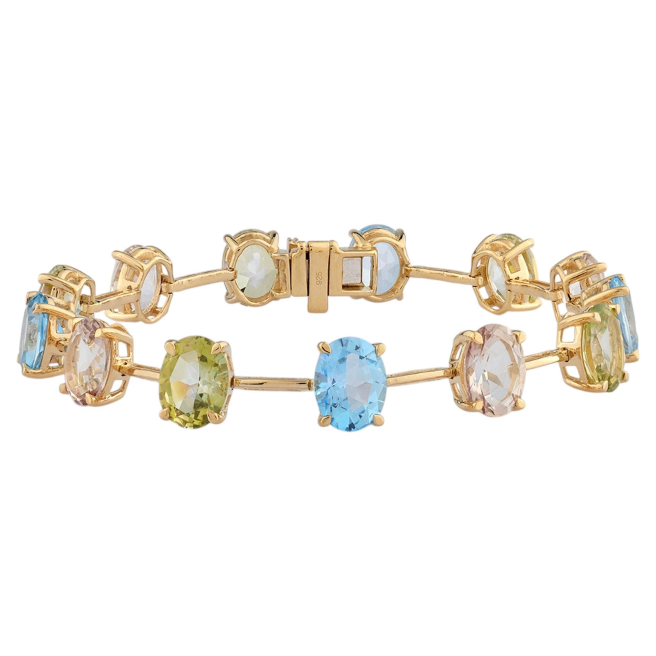 Pulsera tipo «tenis» de plata de ley 925 con varias piedras preciosas de 26,26 quilates, de corte ovalado y chapada en oro