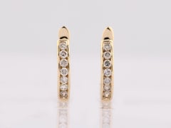 Boucles d'oreilles créoles rondes en or jaune 14 carats serties de diamants
