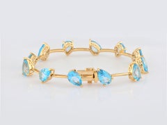 Pulsera de eslabones de plata 925 «Ocean Breeze», con topacio azul claro y chapado en amarillo, 16,08 quilates