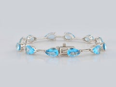 Pulsera de plata de ley 925 «Celestial» con eslabones y un topacio azul de 16,08 con corte en pera
