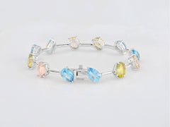 Pulsera de eslabones de plata 925 con topacios de corte en pera y ovalado, de 20,16 quilates, chapada en blanco