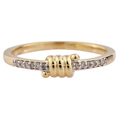 Bague fantaisie en or jaune 14 carats sertie de diamants