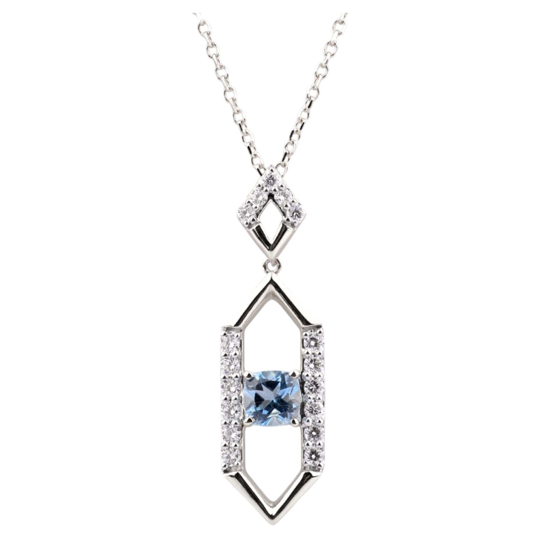 Collar con colgante en forma de lágrima de oro blanco de 14 quilates con topacio azul suizo y diamantes