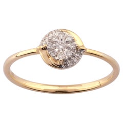 Bague en or jaune 14 carats avec diamants disposés en grappe, de forme circulaire, à monture « bypass »