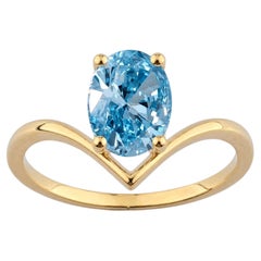 Classic 14K Yellow Gold Oval Blue Topaz V-Shaped Solitaire Gold Ring