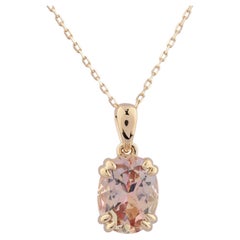 Collana con ciondolo in oro giallo 14 carati con solitario ovale in topazio rosa da 2,02 carati