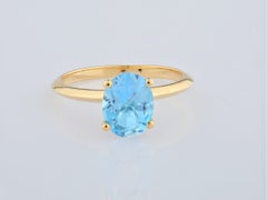 14K Yellow Gold 2.02 Cts Oval Cut Blue Topaz Solitaire Ring