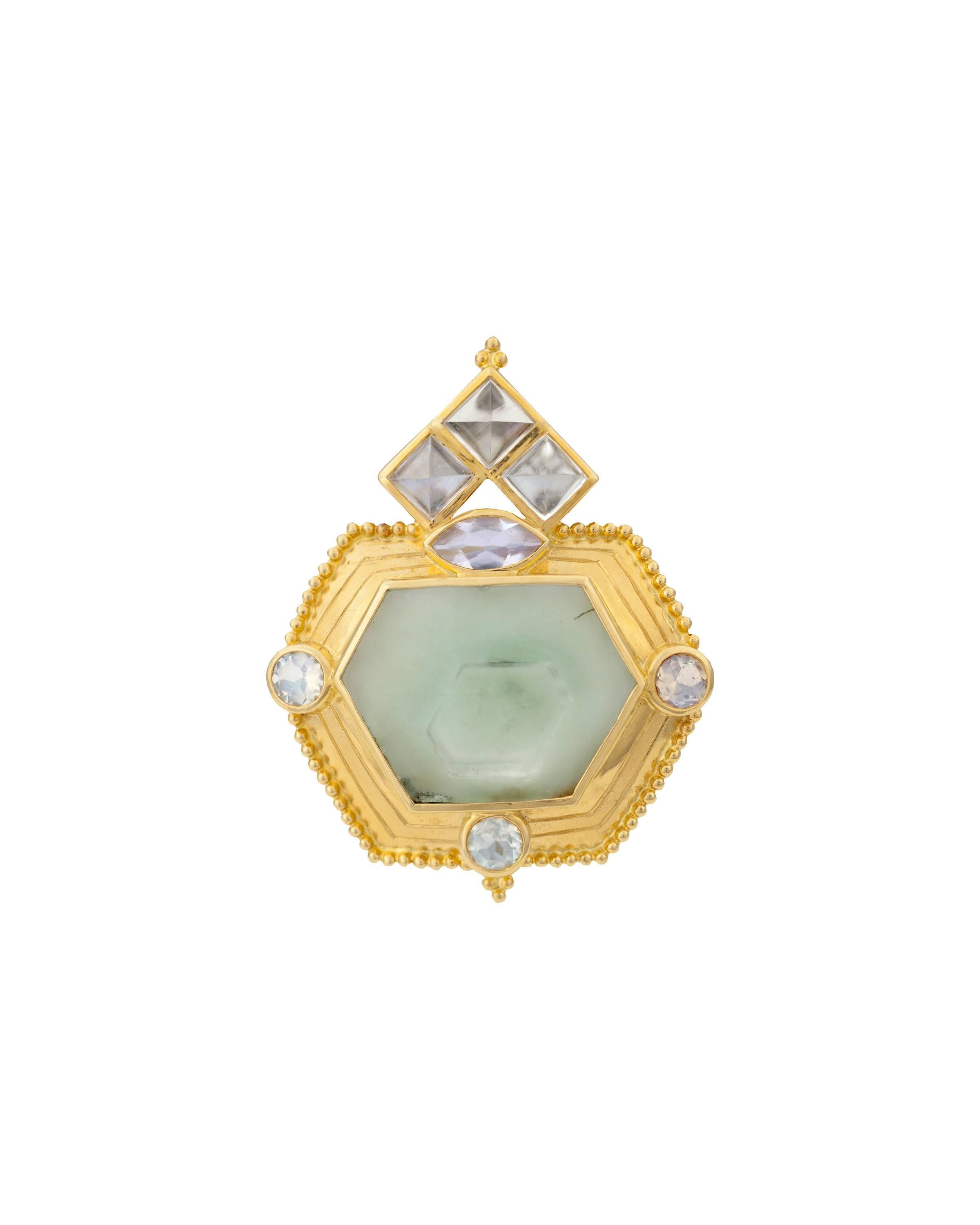 Crevoshay's handmade one of a kind brooch takes one's breath away.  The beryl resides at the center of the piece, with moonstones adding to the allure. 

Moonstone Sq=3.13ct.