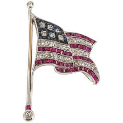 gold mounted sapphire, ruby diamond USA flag brooch set diamonds