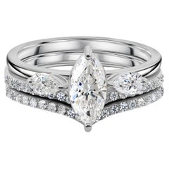 Conjunto de anillos de boda con un diamante natural de 1,31 quilates en talla marquesa, engastado en oro blanco de 18 quilates