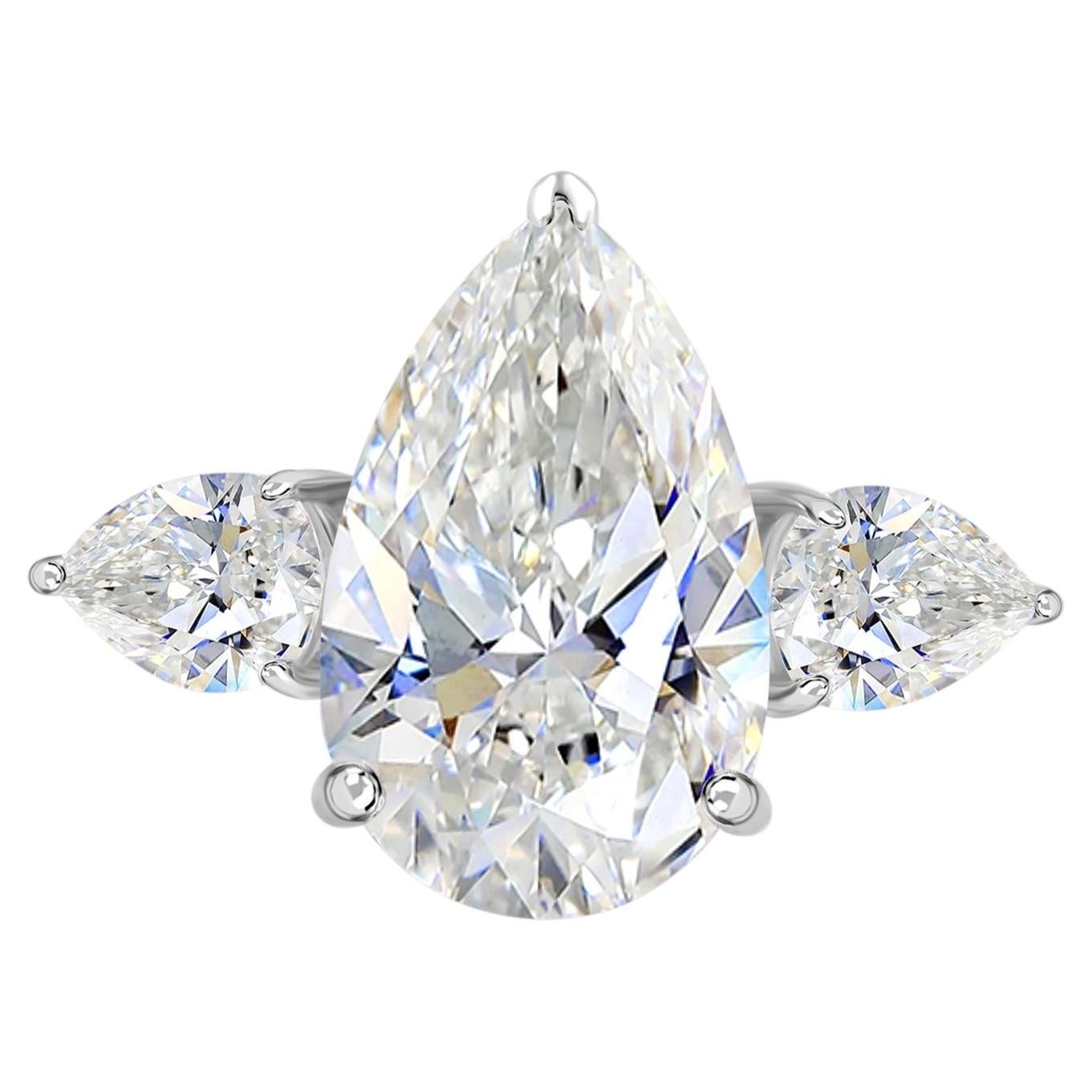 5.04 Carat Natural Pear Shaped Trilogy Diamond Ring in 18K White Gold