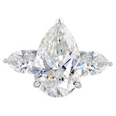 5.04 Carat Natural Pear Shaped Trilogy Diamond Ring in 18K White Gold