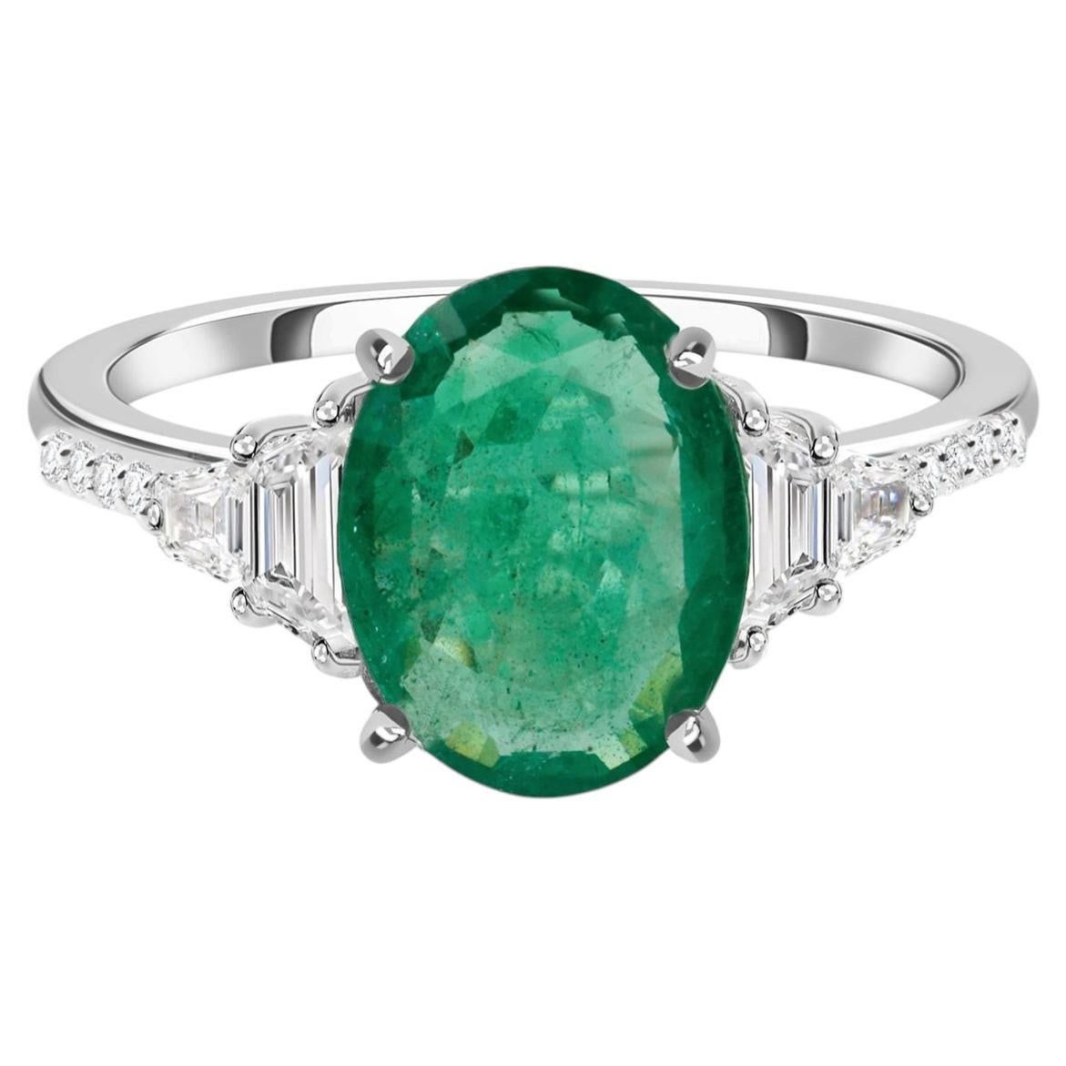 2.51 Ct Oval Zambian Emerald 0.34 Ct Diamond Three Stone Ring in 18K White Gold