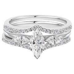 Ensemble de trois bagues en or blanc 18 carats, serties de diamants naturels de 0,99 carat, taille marquise et poire