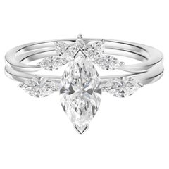 Set di due anelli con motivo floreale realizzati a mano, con diamante naturale taglio marquise da 1,08 carati, in oro bianco 18 carati