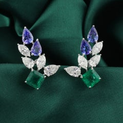 Pendientes en forma de ala con esmeralda natural de 6,68 ct, tanzanita y diamantes, en oro blanco de 18 quilates