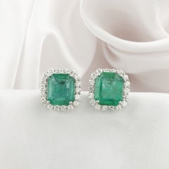 Emerald-Cut Emerald and Diamond Halo Stud Earrings, 10.82 Carats, 18K White Gold