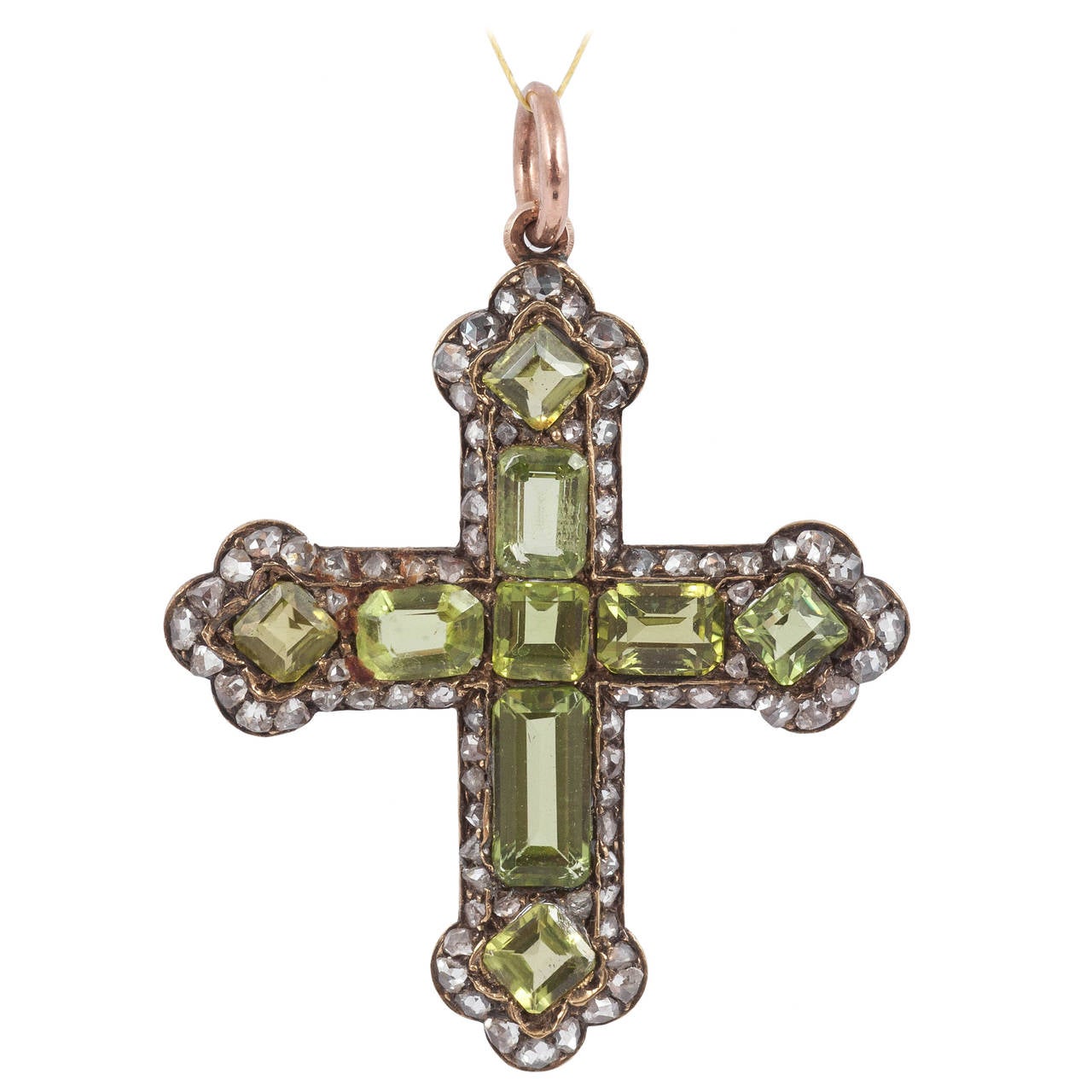 Peridot pendant in shape of a cross For Sale