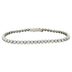 Estate Platinum Rounded Diamond Bezel Tennis Bracelet