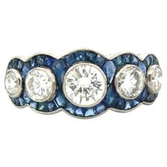 Art-Déco-Ring aus Platin mit Old-Mine-Diamant und blauen Saphiren