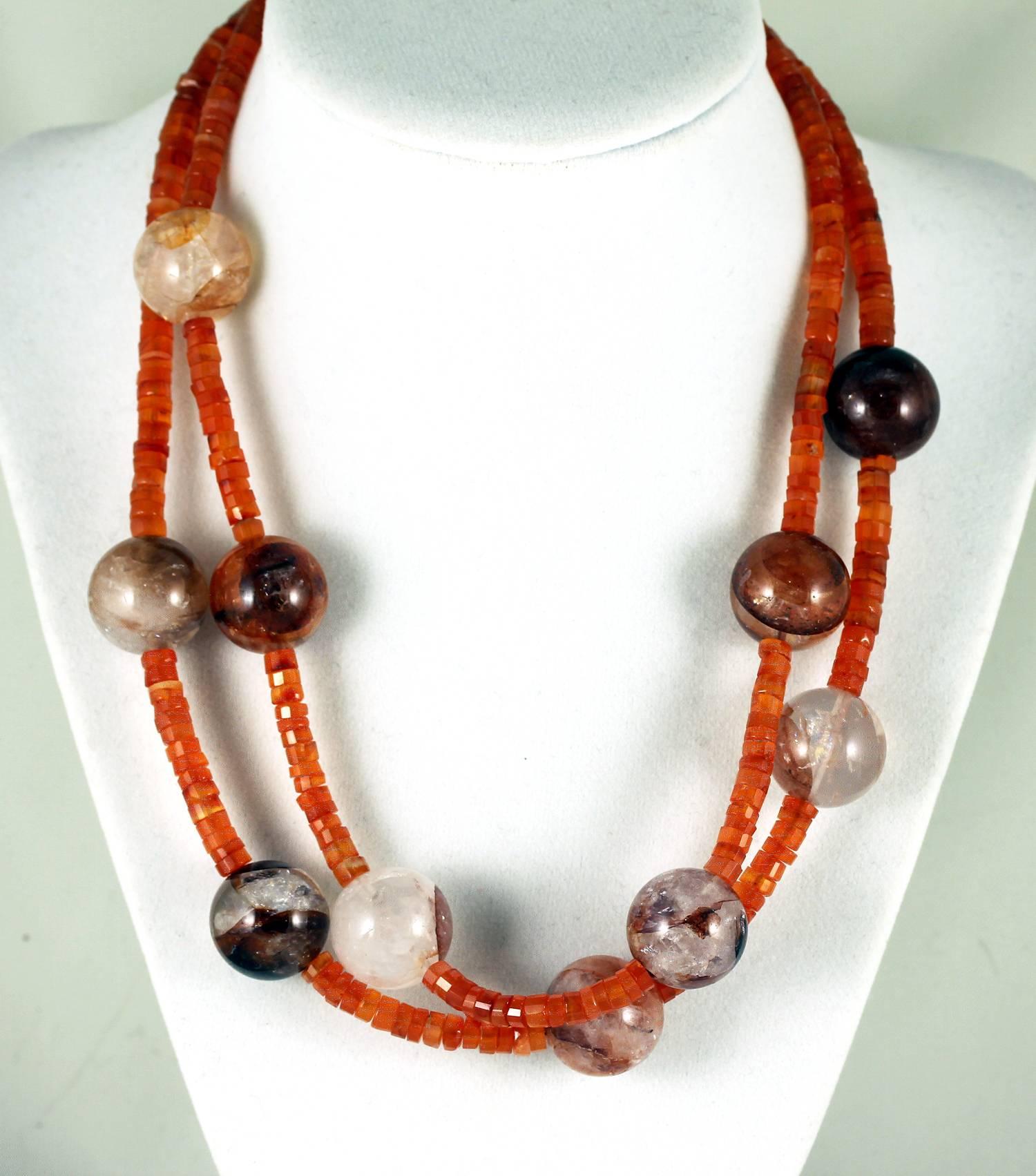 If you like Orange this double strand of gemcut highly polished Carnelian is enhanced with large translucent glowing bright Strawberry Quartz glowing beautifully around your neck evening or daytime.
Size:  Quartz approximately 18 mm
Length:  18