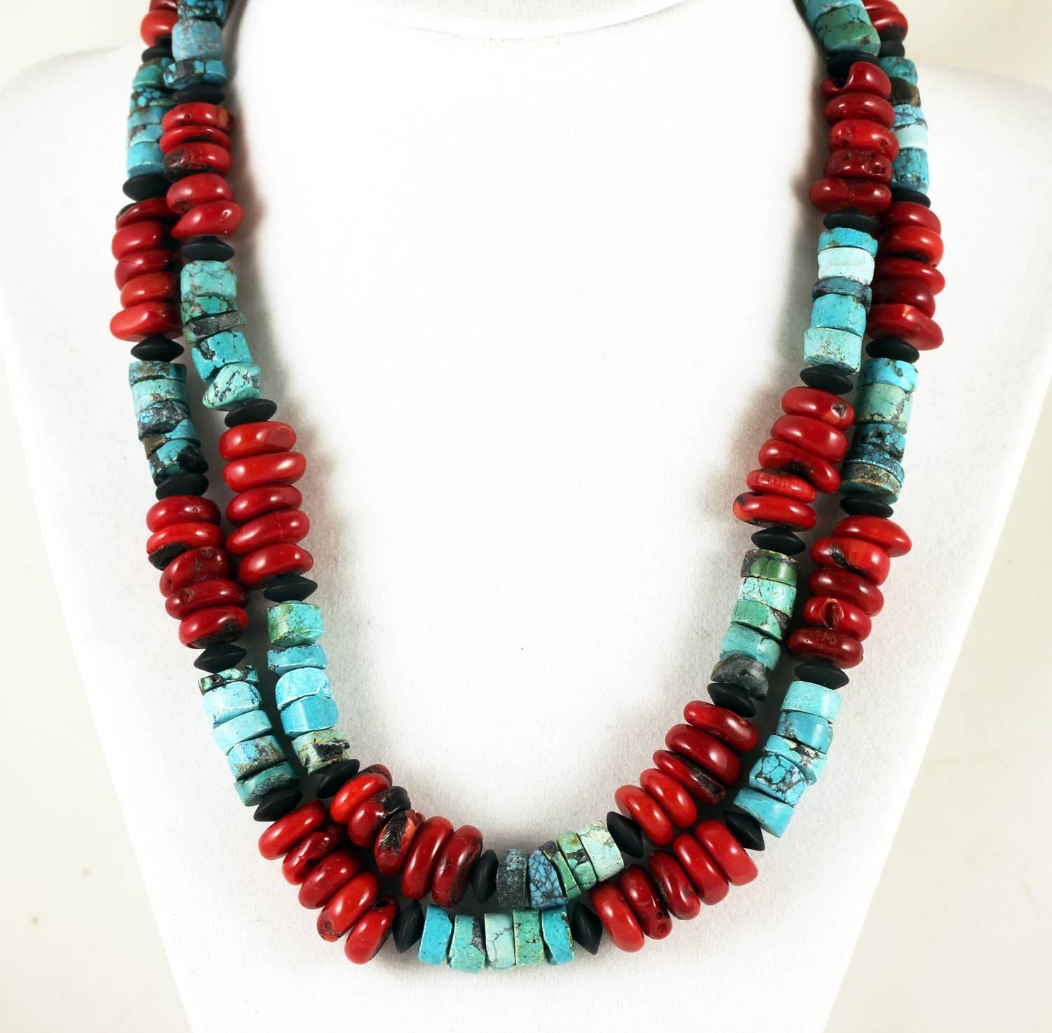 Unique handmade double strand of natural Arizona Turquoise rondels and polished gemmy slices of  red Bamboo Coral accented with black Onyx rondels
Size:  Coral varies approximately 12 mm
Length:  18 inches
Clasp:  silver tone
